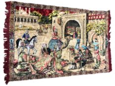 An embroidered throw / wall hanging depicting an eastern market scene,