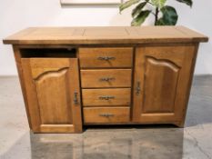 An Oak Furniture Land sideboard, 150 cm x 50 cm x 85 cm.