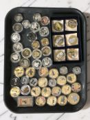 A collection of gold plated and other crown sized commemorative issue coins including royalty,