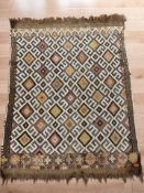 An antique flatweave Kilim, 136 cm x 105 cm.