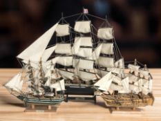 Three ship models including two of the Cutty Sark, tallest 52 cm.