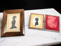 A Regency silhouette portrait of a lady, in rosewood frame, overall 17 cm x 14 cm,
