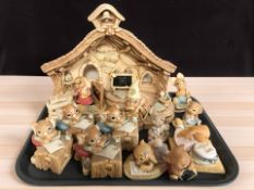 A collection of Pendelfin rabbits.