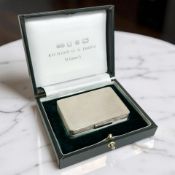 An Elizabeth II silver box, Richard Jarvis, London 2004, with all-over engine turned decoration,