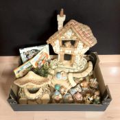 A collection of Pendelfin rabbits.