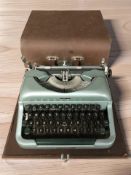 An Imperial Good Companion 4 typewriter, in case.