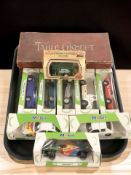 A group of Lledo and Corgi boxed die cast vehicles, a table croquet set, etc.