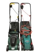 Two electric lawnmowers.