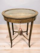 An Edwardian oval mahogany and satinwood inlaid bijouterie table.