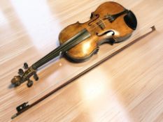 A late 19th / early 20th century violin, with one piece 14