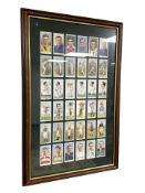A framed collage of reproduction Imperial Tobacco Limited cards depicting association footballers,