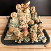 A collection of Pendelfin rabbits.