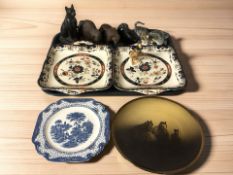 A pair of Masons ironstone twin handled dishes, carved wooden animal ornaments, further plates,