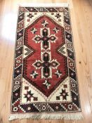 A Dosemealti rug, Anatolia, 147 cm x 72 cm.