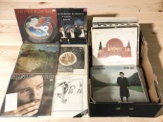 Vinyl records including Elton John, The Steve Miller Band, John Denver, Bruce Springsteen,