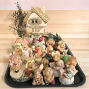 A collection of Pendelfin rabbits.