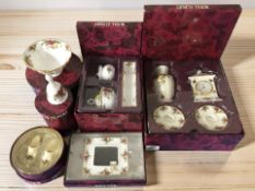 A collection of boxed Royal Albert Old Country Roses cabinet porcelain including photo frame,