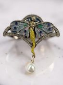 An Art Nouveau style brooch with enamel and cubic zirconia