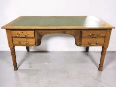 A 20th century oak and pine writing desk, 153 cm x 83 cm x 76 cm.