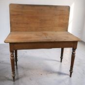 A Victorian mahogany turnover top tea table, width 123 cm.