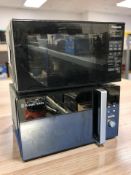 A Russell Hobbs microwave and a Panasonic microwave.