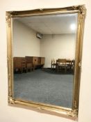 A contemporary gilt mirror, 137 cm x 106 cm.