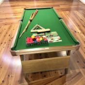An Ambassador 6ft folding snooker table, with set of balls, cues, etc.