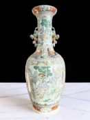 A large Canton famille rose porcelain twin-handled baluster vase, Qing Dynasty, 19th Century,