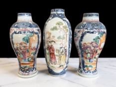 A pair of Chinese blue and white porcelain 'Mandarin' baluster vases,