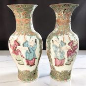 A large pair of Canton famille rose porcelain baluster vases, Qing Dynasty, 19th Century,
