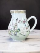 A Chinese famille rose porcelain sparrow beak jug, Qianlong, 18th century, height 10 cm.