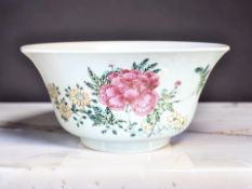 A Chinese famille rose porcelain bowl, the body with floral sprays,