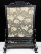 A Chinese carved hardwood and silk screen, circa 1900, height 113 cm.