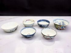 A Chinese porcelain famille rose bowl, decorated with ladies in a garden,