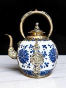 A Chinese blue and white porcelain and gilt metal-mounted teapot, height 17.5 cm.