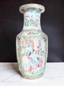 A Canton famille rose porcelain baluster vase, 19th century, decorated with panels of exotic birds,