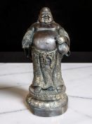 A Chinese hollow cast patinated bronze figure of the Laughing Buddha or Hotei, late 19th century,