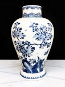 A Chinese blue and white porcelain vase in the Kangxi style but probably later,