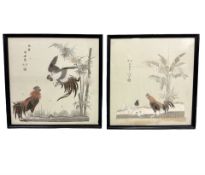 A pair of Chinese embroidered silk panels depicting roosters,