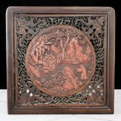 A Chinese cinnabar circular lacquer panel in carved hardwood frame, Qing Dynasty,