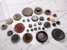 Thirty Chinese carved hardwood stands for vases and figures, largest diameter 29 cm.