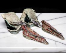 A pair of Chinese embroidered silk child's shoes, length 11 cm,