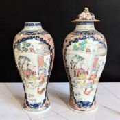 A pair of Chinese famille rose porcelain baluster vases, Qianlong, 18th century,