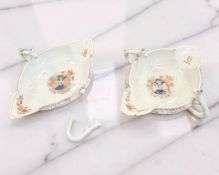 A pair of Chinese famille rose armorial two-handled double-lipped sauce boats,