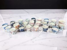A collection of twenty three Chinese porcelain tea cups including famille rose,