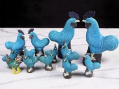 A group of Chinese mainly turquoise glaze porcelain cockerels, 20th century, tallest 34 cm.