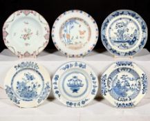 A Chinese Imari porcelain shallow bowl decorated with stalks of bamboo and chrysanthemum blossom,