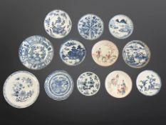 Twelve Chinese porcelain saucer dishes, 18th century and later, largest diameter 15.5 cm.