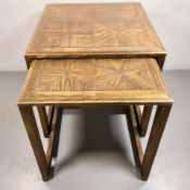 A nest of two oak parquetry tables, width 50 cm.