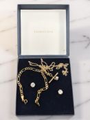 A 9ct gold trace link chain, a further bracelet,